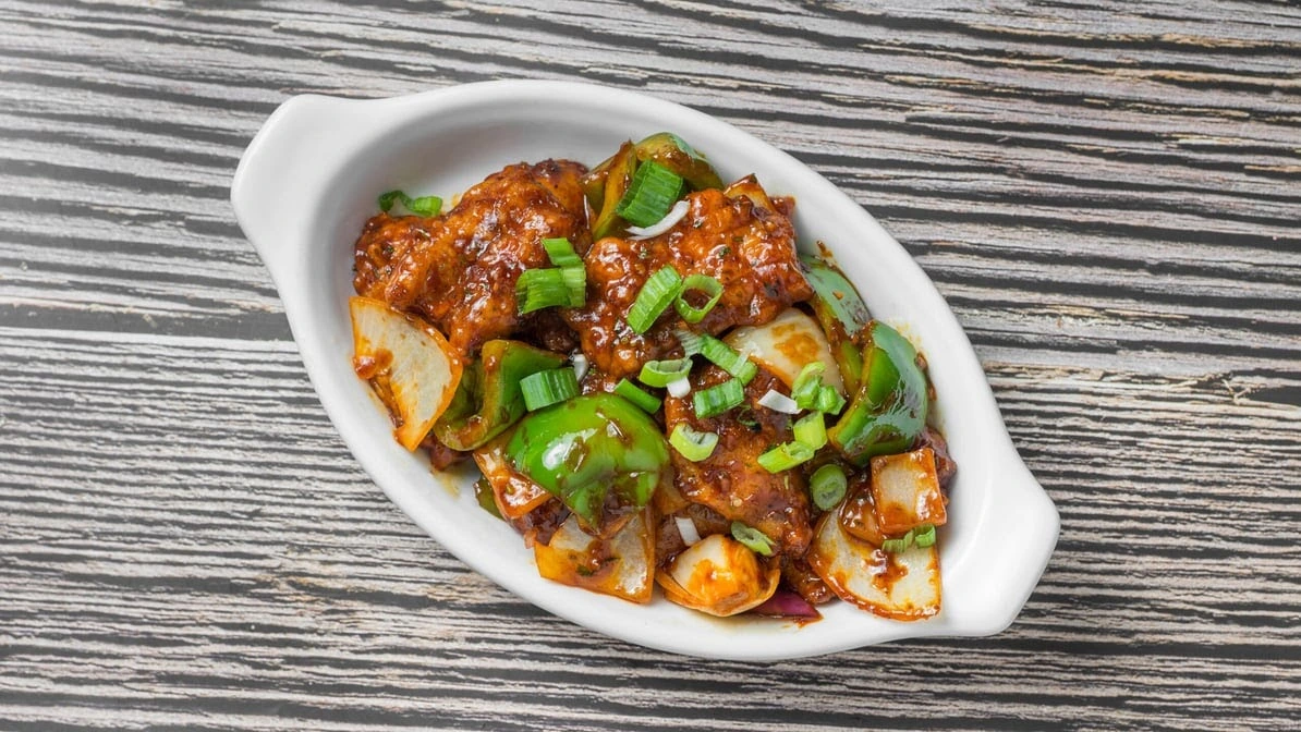 Indo-Chinese Chilli Chicken in Edmonton - Bollywood Indian Cuisine fusion dish